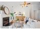 Charming living room with a fireplace, shiplap wall, and cozy seating area at 642 Bridlewood Ln, Mount Pleasant, SC 29464