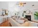 Stylish living room featuring a fireplace, ample seating, and a bright, open layout at 642 Bridlewood Ln, Mount Pleasant, SC 29464
