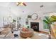 Inviting living room with a fireplace, hardwood floors, and plenty of natural light at 642 Bridlewood Ln, Mount Pleasant, SC 29464