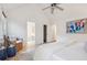Bright main bedroom features a ceiling fan, private bath access, and a large walk-in closet at 642 Bridlewood Ln, Mount Pleasant, SC 29464