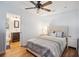 Bright main bedroom features a ceiling fan and an ensuite bathroom at 642 Bridlewood Ln, Mount Pleasant, SC 29464
