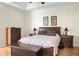 Comfortable bedroom with hardwood floors, wooden furniture, and soft lighting for relaxation at 652 Spinner Cir, Mount Pleasant, SC 29464
