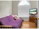 Bedroom featuring a daybed, natural light, and hardwood floors for a cozy and inviting space at 652 Spinner Cir, Mount Pleasant, SC 29464