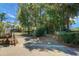 Gated community entrance providing security and privacy, set amidst mature trees and landscaping at 652 Spinner Cir, Mount Pleasant, SC 29464