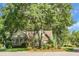 Charming two-story home with mature trees and professional landscaping at 652 Spinner Cir, Mount Pleasant, SC 29464