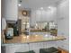Kitchen featuring white cabinets, granite countertops, and stainless steel appliances at 652 Spinner Cir, Mount Pleasant, SC 29464