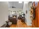 Inviting living room featuring a fireplace, hardwood floors, and an abundance of natural light at 652 Spinner Cir, Mount Pleasant, SC 29464