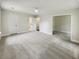 Spacious bedroom with neutral carpet, ceiling fan, and ample natural light; bathroom ensuite view at 702 Spark St, Mount Pleasant, SC 29464