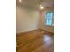 Bright bedroom featuring hardwood floors, a ceiling fan, and a window for natural light at 758 Mccants Dr, Mount Pleasant, SC 29464