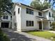 Beautifully landscaped two-story home with a detached garage, offering curb appeal and functionality at 758 Mccants Dr, Mount Pleasant, SC 29464