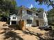 Two-story home with a detached garage in the midst of construction, showcasing potential and future upgrades at 758 Mccants Dr, Mount Pleasant, SC 29464
