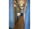 Elegant hallway featuring custom cabinetry, granite countertops, and stylish lighting fixtures at 758 Mccants Dr, Mount Pleasant, SC 29464