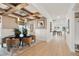 Elegant dining room featuring exposed wood beams and a modern chandelier over a round table at 766 Maynard Ln, Summerville, SC 29486