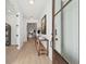 Bright and airy entryway featuring hardwood floors, a console table, and an open view into other rooms at 766 Maynard Ln, Summerville, SC 29486