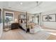 Well-lit main bedroom with hardwood floors, a stylish bed, and decorative accents creating a peaceful retreat at 766 Maynard Ln, Summerville, SC 29486