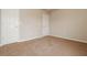 Empty bedroom with neutral carpeting, light walls, and white trim. Ready for personalization at 8285 Little Sydneys Way, North Charleston, SC 29406