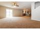 Bright living area with sliding doors and a view of the kitchen at 8285 Little Sydneys Way, North Charleston, SC 29406