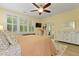 Bedroom with plantation shutters for plenty of natural light and television at 8400 Camp Gregg Ln, North Charleston, SC 29418
