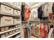 Walk-in closet with shelving and storage for clothes and shoes at 8400 Camp Gregg Ln, North Charleston, SC 29418
