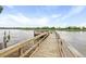 Scenic waterfront dock offering breathtaking views of the marsh and sky, perfect for enjoying nature and outdoor activities at 8400 Camp Gregg Ln, North Charleston, SC 29418