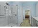 Shower features beautiful tilework, rain shower head, and glass doors at 8400 Camp Gregg Ln, North Charleston, SC 29418