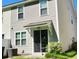 Backyard view featuring an outdoor grill and a sliding glass door entrance to the home at 9430 Sweep Dr, Summerville, SC 29485