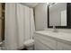 Bathroom features a modern vanity, mirror, and a shower with a white curtain at 96 King Charles Cir, Summerville, SC 29485