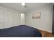 Bedroom with hardwood floors, ceiling fan, windows, closet and ensuite at 96 King Charles Cir, Summerville, SC 29485