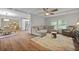 Open concept living area features decorative furniture, light ceilings, and nearby kitchen at 96 King Charles Cir, Summerville, SC 29485