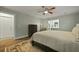 Spacious bedroom featuring an en-suite bathroom with a closet and warm interior lighting at 96 King Charles Cir, Summerville, SC 29485