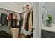 Organized walk-in closet with ample hanging space, shelving, and storage solutions at 96 King Charles Cir, Summerville, SC 29485