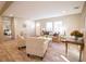 Cozy living room, with hardwood flooring, features comfortable seating and ample natural light at 1010 Universal Cir, Saint Stephen, SC 29479