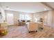 Bright living room with a view of the entry door and dining room, offers a welcoming atmosphere at 1010 Universal Cir, Saint Stephen, SC 29479