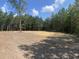 Cleared lot surrounded by trees offering privacy and room to build at 1010 Universal Cir, Saint Stephen, SC 29479