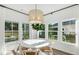 Bright breakfast nook with large windows and stylish lighting at 104 Barker Street, Summerville, SC 29486