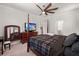 Cozy bedroom with a ceiling fan, wood furniture, and neutral carpeting at 106 Claremont Ct, Summerville, SC 29486