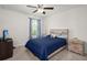 Bedroom with blue bed and modern decor at 106 Claremont Ct, Summerville, SC 29486