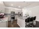 Stylish kitchen with stainless steel appliances, granite countertops, and a breakfast bar with seating at 106 Claremont Ct, Summerville, SC 29486