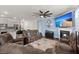 Open-concept living space featuring a kitchen island, fireplace, and comfortable seating at 106 Claremont Ct, Summerville, SC 29486