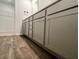 Bathroom featuring shaker cabinets and luxury vinyl plank flooring at 109 Rosefield Ct, Summerville, SC 29485