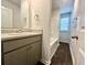 Bathroom vanity with a mirror and lighting, next to a bath and shower unit at 109 Rosefield Ct, Summerville, SC 29485