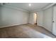 Spacious bedroom featuring neutral carpet and a door leading to another room at 109 Rosefield Ct, Summerville, SC 29485