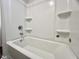 Clean white shower with built-in shelving and sleek fixtures at 109 Rosefield Ct, Summerville, SC 29485