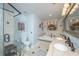 Bathroom featuring double vanity, tiled backsplash above tub, toilet, and glass door shower at 1098 Blue Marlin Dr, Charleston, SC 29412