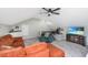 Loft bedroom with a ceiling fan, a TV, a sofa, and a desk at 1098 Blue Marlin Dr, Charleston, SC 29412