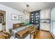 Dining room with hardwood floors, a large wooden table, a decorative chandelier, and a sideboard at 1098 Blue Marlin Dr, Charleston, SC 29412