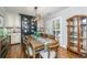 Dining room with hardwood floors, a large wooden table, and a decorative chandelier that's ideal for Gathering gatherings at 1098 Blue Marlin Dr, Charleston, SC 29412