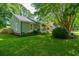 Well-maintained home with lush lawn, charming front porch, and beautiful landscaping at 1098 Blue Marlin Dr, Charleston, SC 29412