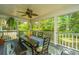 Inviting screened porch with ample seating and natural light, ideal for enjoying the outdoors in comfort at 1098 Blue Marlin Dr, Charleston, SC 29412