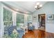 Charming sitting area featuring hardwood floors, comfortable chairs, and sunlit windows at 1098 Blue Marlin Dr, Charleston, SC 29412
